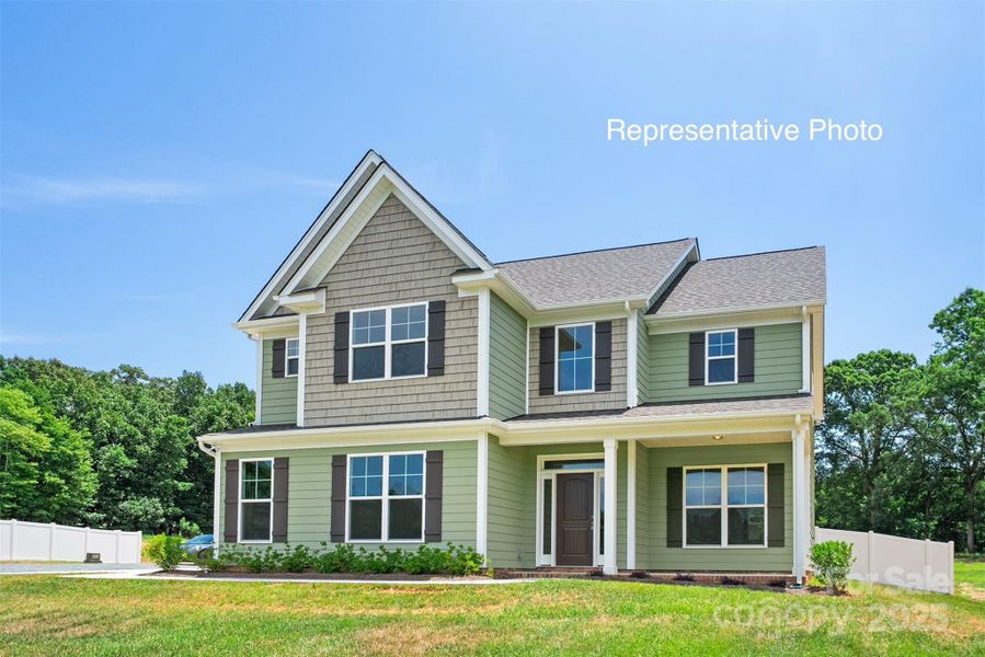 Front exterior of a new home in , Wingate, NC, highlighting curb appeal (Image 1).