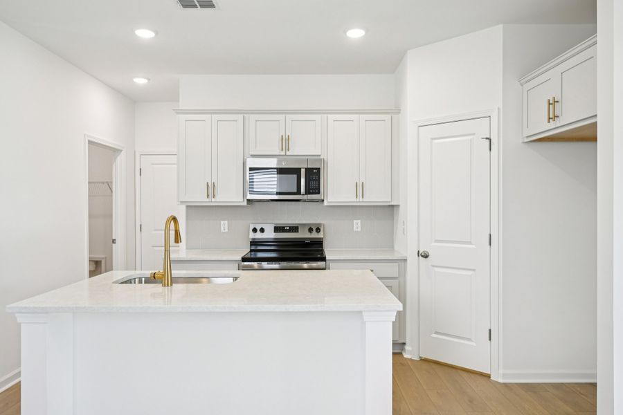 Representative furnished interior of a home built from the Grove by Ashton Woods in Middleton Farms, Middlesex (Image 6).