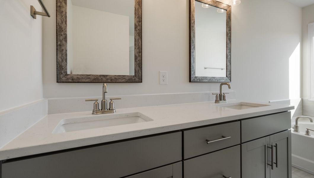 Representative furnished interior of a home built from the LONDON by D.R. Horton in Adams Glen, Greenville (Image 13).