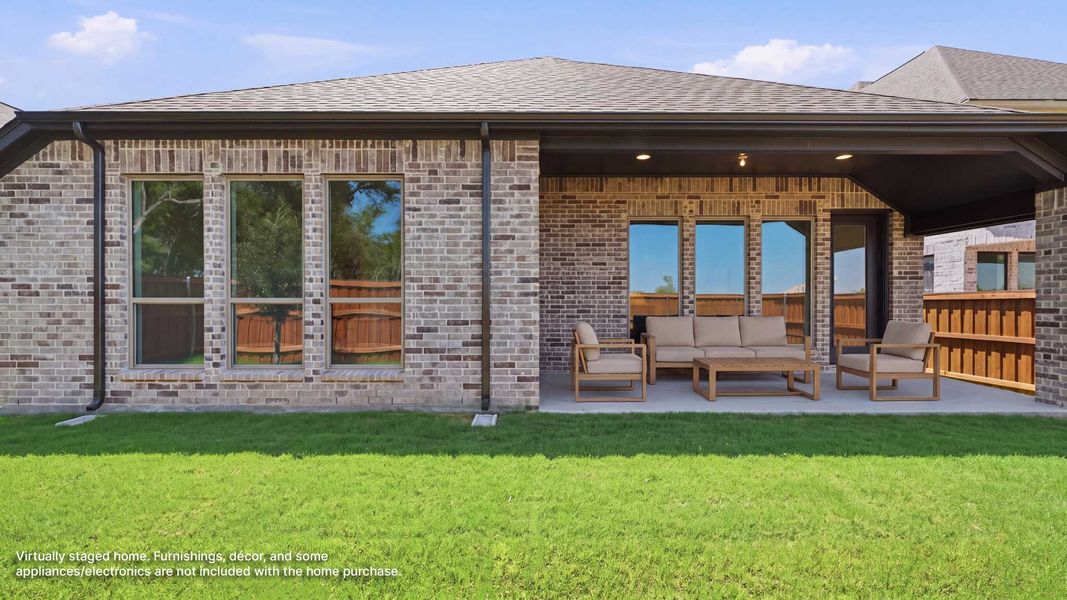 Exterior details and patio area of a home in Mustang Lakes, Celina (Image 3). Exterior details and patio area of a home in Mustang Lakes, Celina (Image 3).