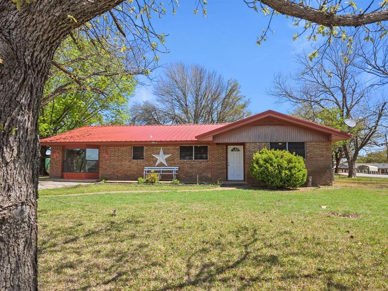 Exterior details and patio area of a home in , Brownwood (Image 14).