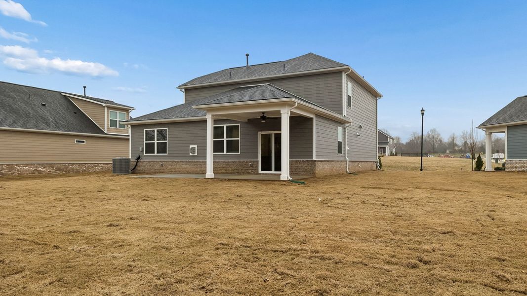 Exterior details and patio area of a home in Reserve at Hickory Ridge, Columbia (Image 28).