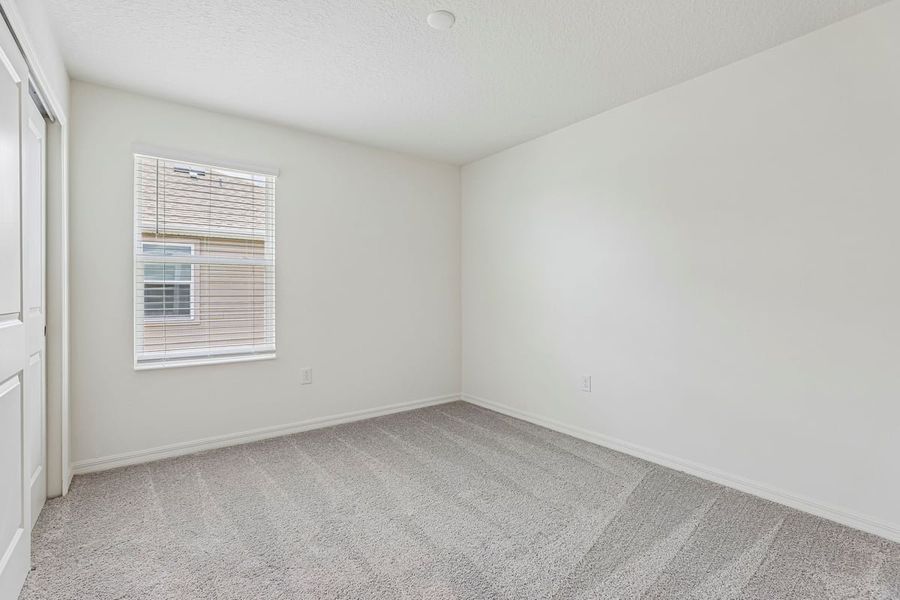 Spacious, unfurnished interior of a new home in Reserve at Forest Lake Townhomes, Lake Wales (Image 18).