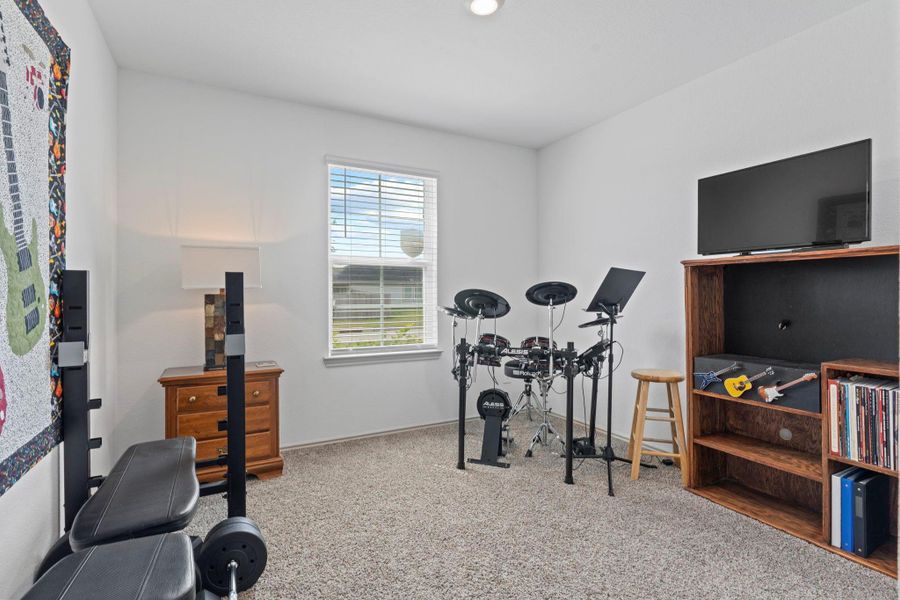 Down the hallway to your right will discover more! Flexible bedroom or hobby room with plush carpet, big window, and ample space for exercise equipment, gaming setup, or guest accommodations. Down the hallway to your right will discover more! Flexible bedroom or hobby room with plush carpet, big window, and ample space for exercise equipment, gaming setup, or guest accommodations.