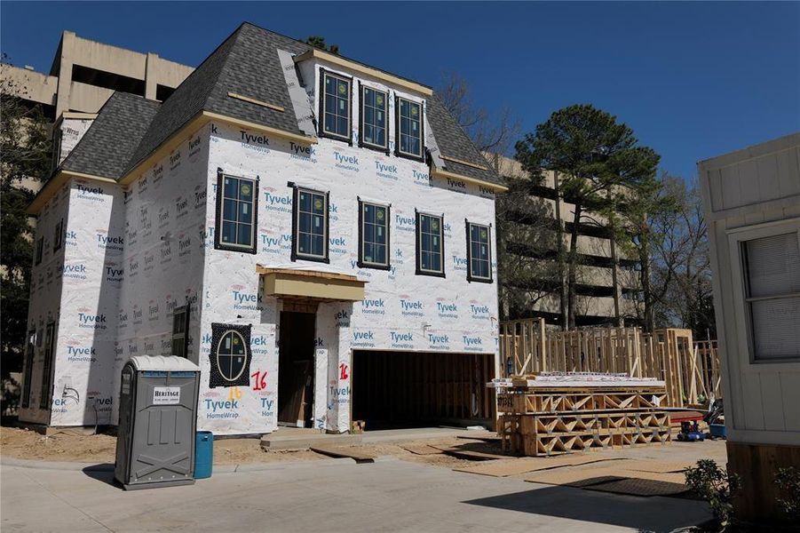 The residence features a slab-on-grade foundation, a comprehensive framing and truss plan that meets all relevant codes and windstorm requirements, as well as borate termite treatment. Additionally, it features CertainTeed Landmark Series shingle composition roof, 6" half-round gutters with round downspouts, and Pella Lifestyle Series exceptionally energy-efficient E-rated windows.