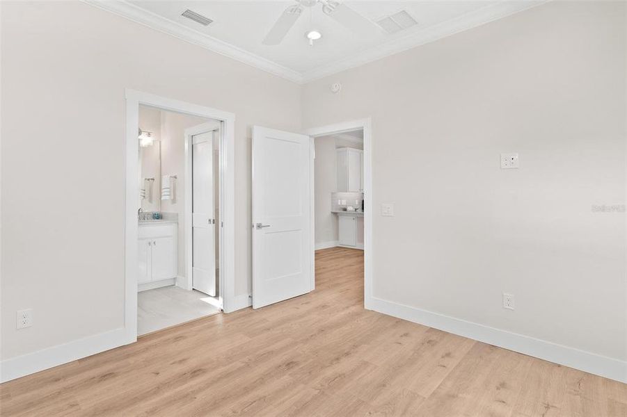 Primary Bedroom with Crown Molding