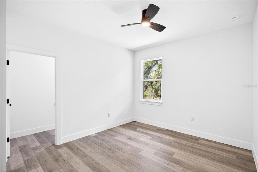 Spacious, unfurnished interior of a new home in , Port Charlotte (Image 31).