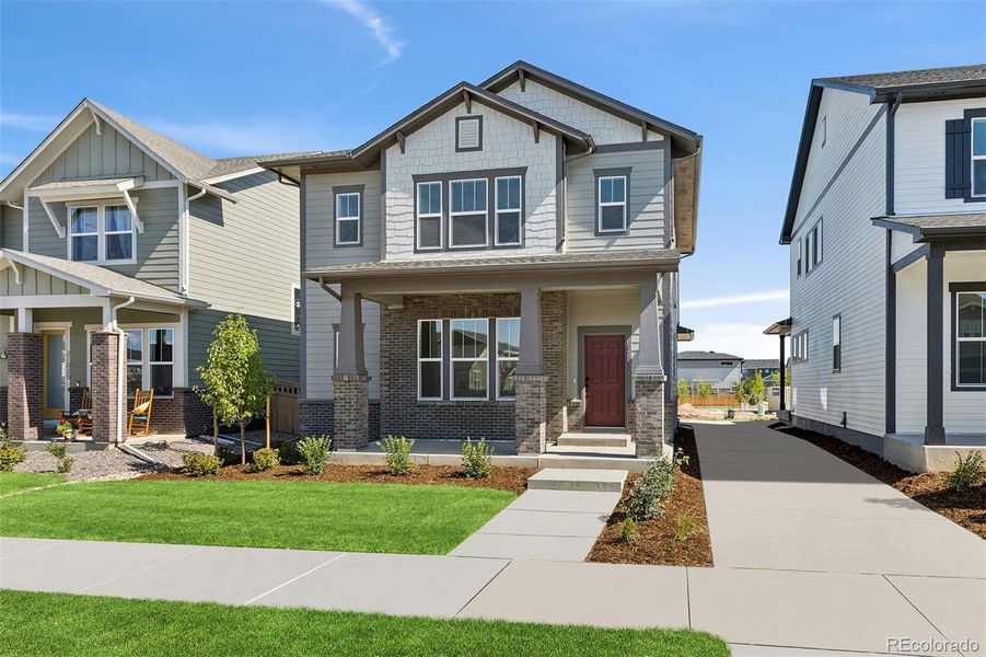 Front exterior of a new home in Painted Prairie Cottage, Aurora, CO, highlighting curb appeal (Image 2).