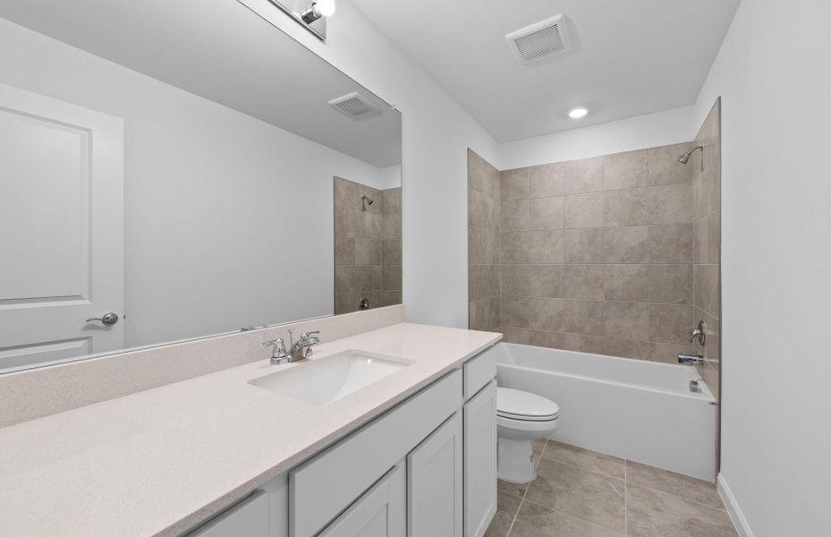 Furnished interior view inside a new home in Caloosa Cove, Labelle (Image 6).