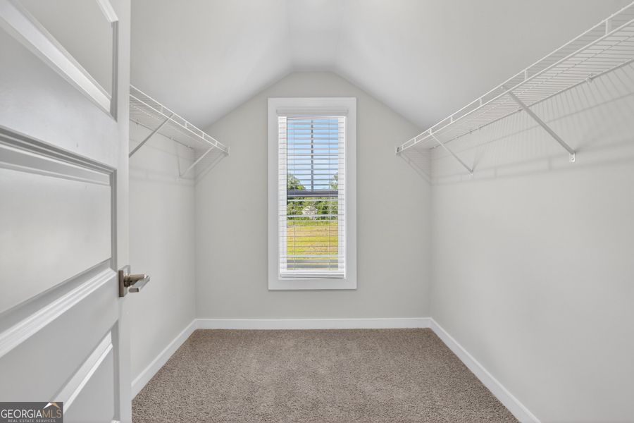 Spacious, unfurnished interior of a new home in The Fairways at Mirror Lake, Villa Rica (Image 54).