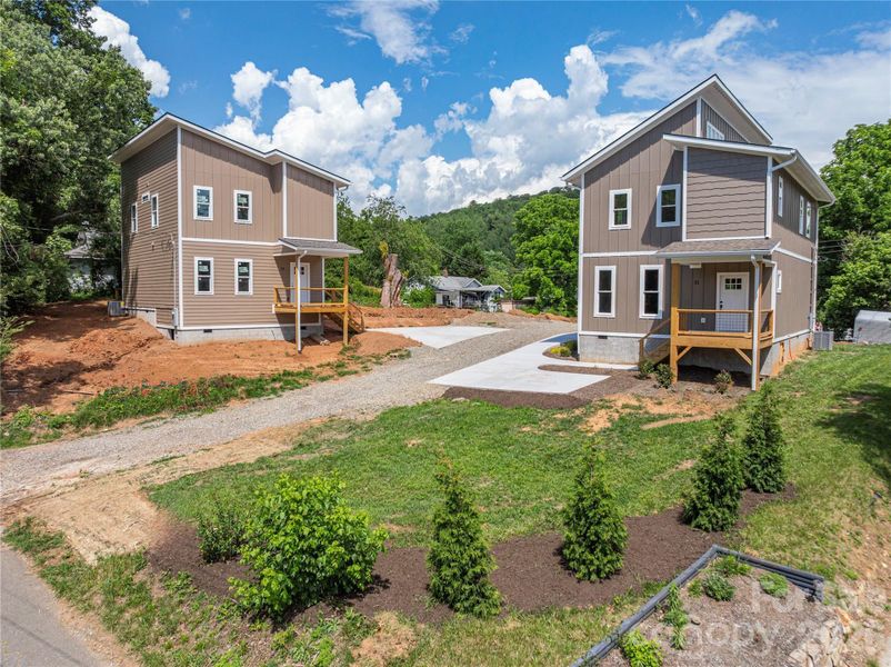 Front exterior of a new home in , Asheville, NC, highlighting curb appeal (Image 1). Front exterior of a new home in , Asheville, NC, highlighting curb appeal (Image 1).