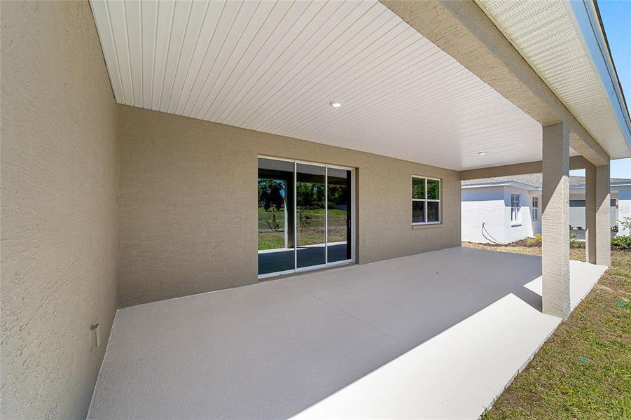 Exterior details and patio area of a home in Calesa Township, Ocala (Image 29).