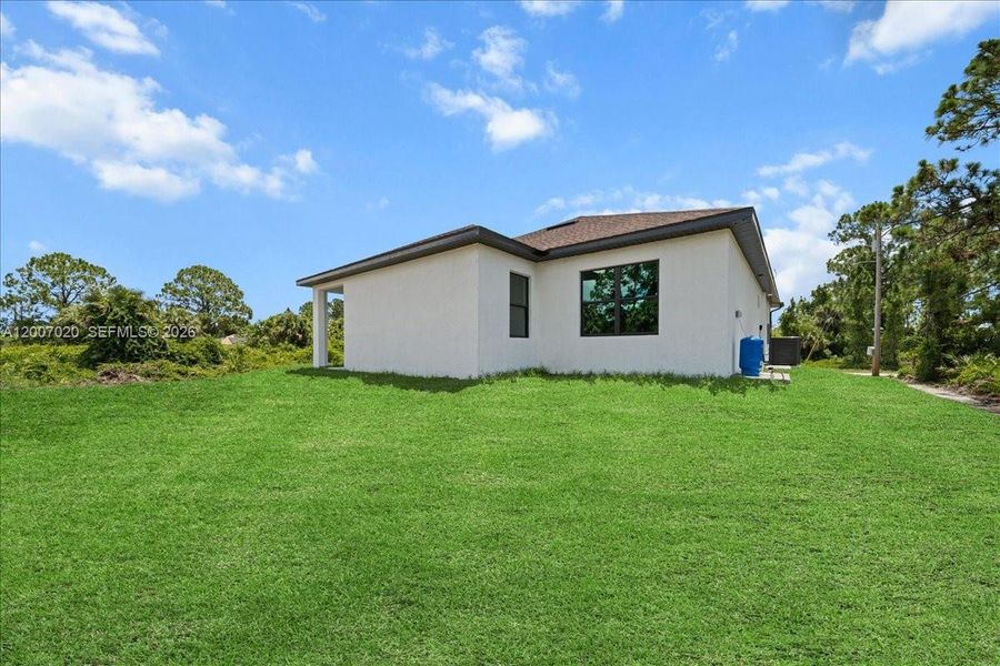 Exterior details and patio area of a home in , Lehigh Acres (Image 28).