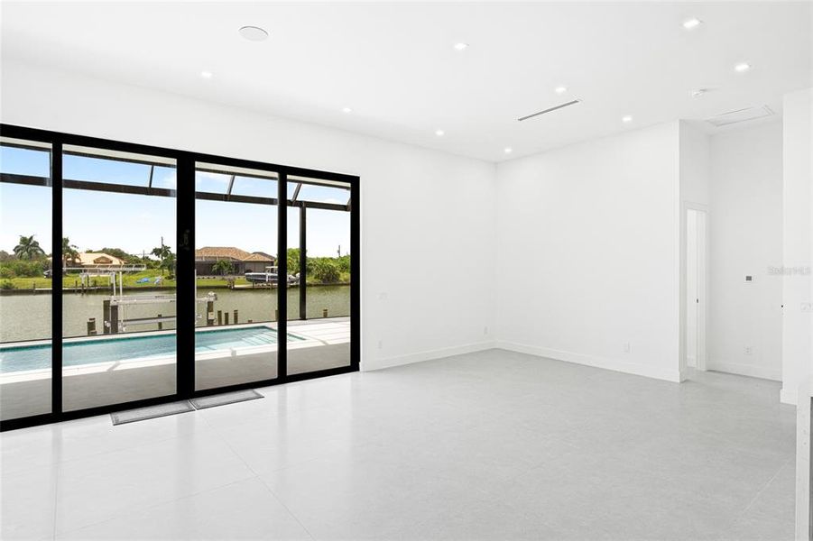 Spacious, unfurnished interior of a new home in , Port Charlotte (Image 61).