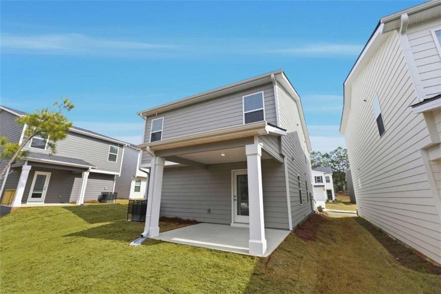 Exterior details and patio area of a home in The Enclave at Stonewall Station, Union City (Image 3).