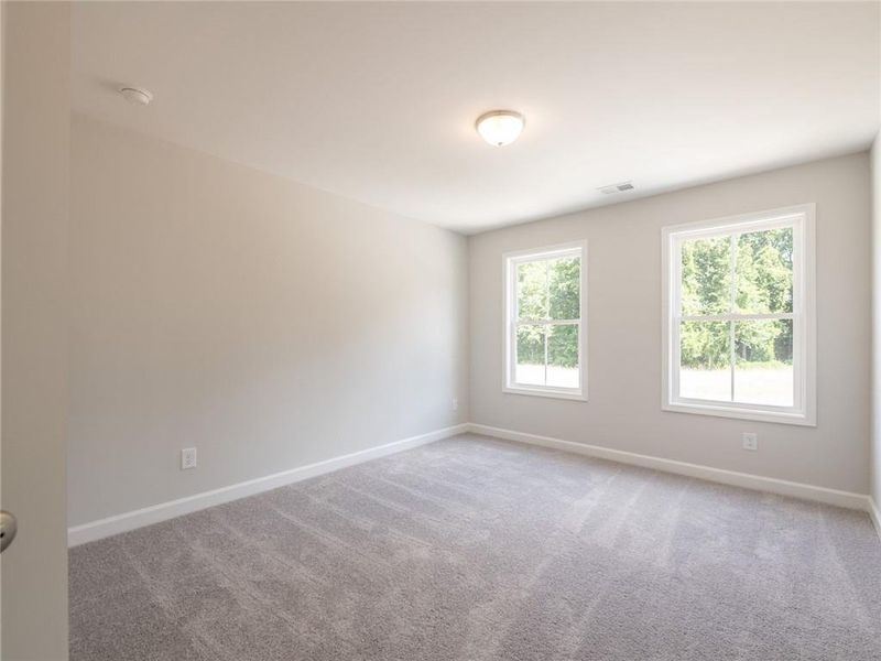 Spacious, unfurnished interior of a new home in River Walk Place, Lawrenceville (Image 32).