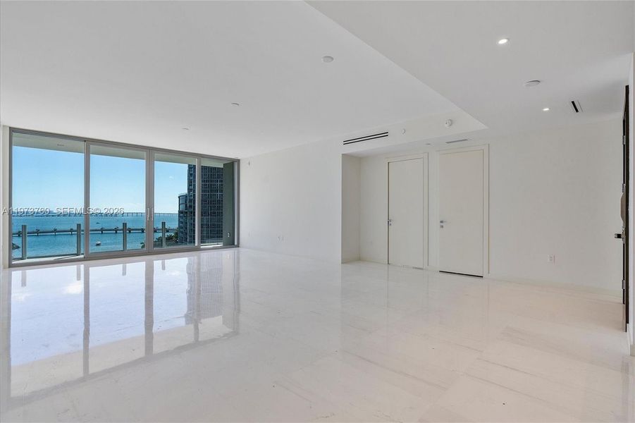 Spacious, unfurnished interior of a new home in Aston Martin Residences, Miami (Image 21).