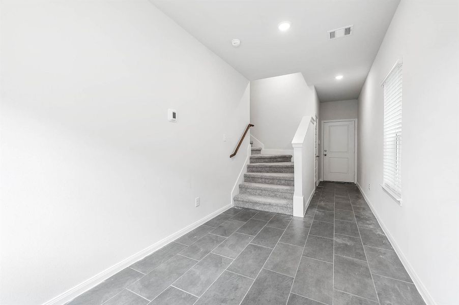 Hallway to the stairs. Hallway to the stairs.