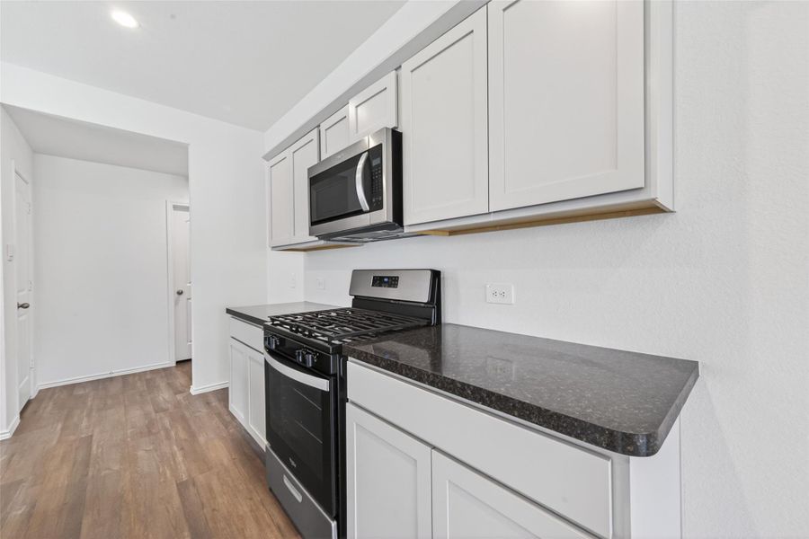 Furnished interior view inside a new home in Breckenridge Forest, Spring (Image 11).