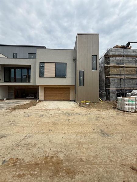 View of front facade featuring a garage View of front facade featuring a garage