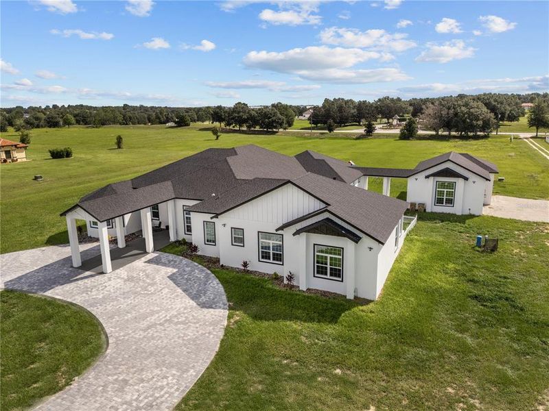 Front exterior of a new home in , Groveland, FL, highlighting curb appeal (Image 2).