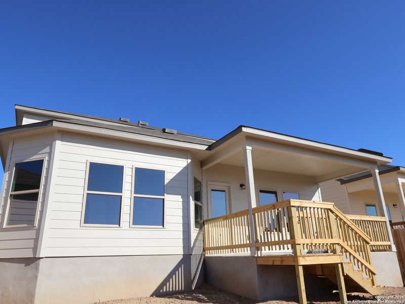 Exterior details and patio area of a home in Hunters Ranch, San Antonio (Image 3).