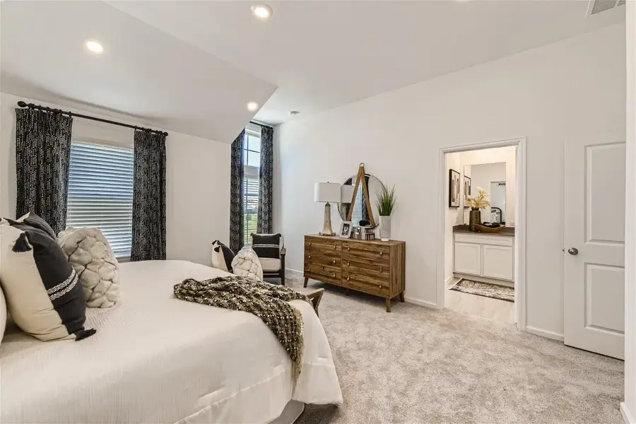 Furnished interior view inside a new home in Bridgeland, Cypress (Image 10).