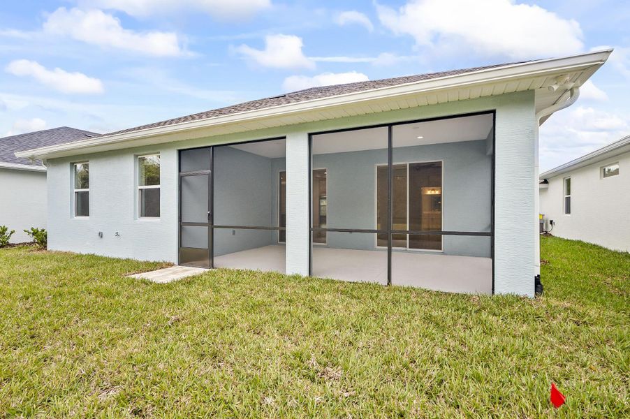 Exterior details and patio area of a home in Matanzas Cove, Palm Coast (Image 32). Exterior details and patio area of a home in Matanzas Cove, Palm Coast (Image 32).