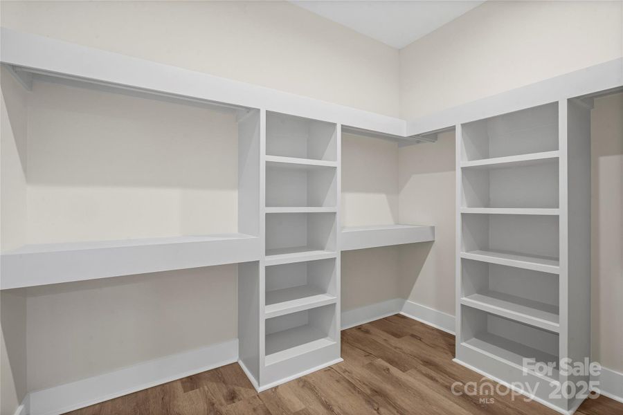 Primary Walk-In Closet Primary Walk-In Closet