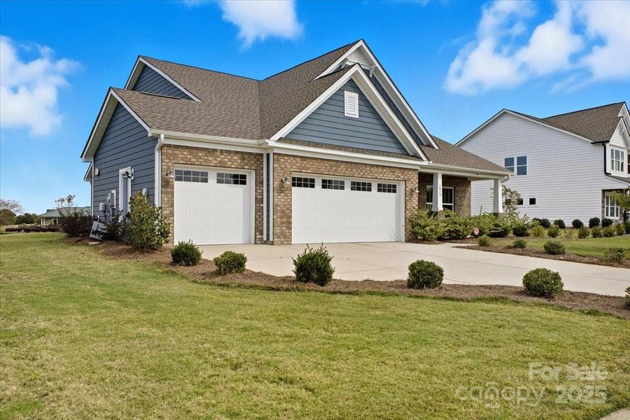 Front exterior of a new home in , Monroe, NC, highlighting curb appeal (Image 25).