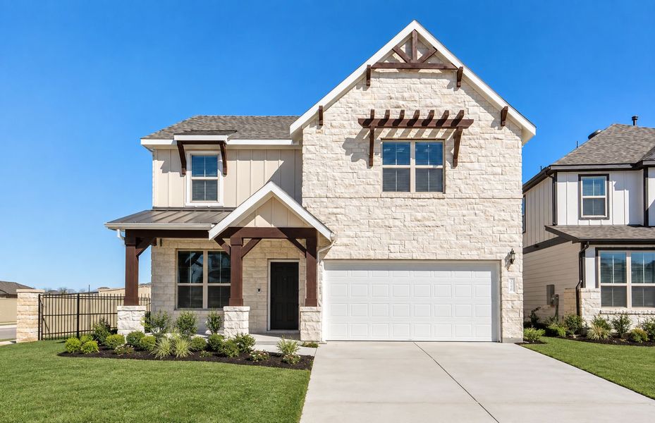 Front exterior of a new home in Santa Rita Ranch, Liberty Hill, TX, highlighting curb appeal (Image 25).