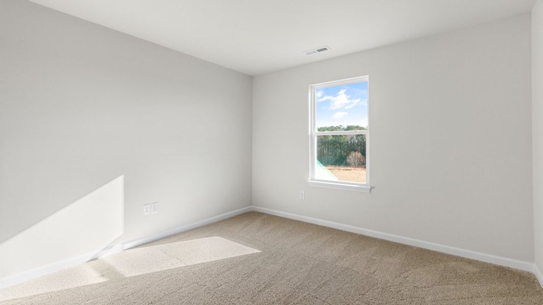 Spacious, unfurnished interior of a new home in The Townes at Honeycutt Oaks, Angier (Image 14).
