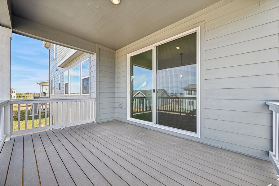 Exterior details and patio area of a home in The Aurora Highlands, Aurora (Image 3).