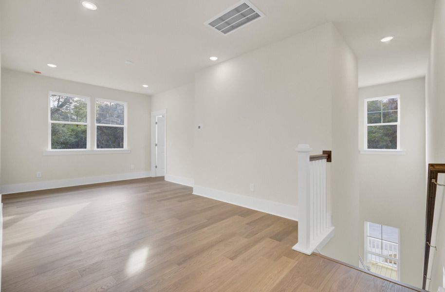 Spacious, unfurnished interior of a new home in Indigo Grove Single Family Homes, Johns Island (Image 19).