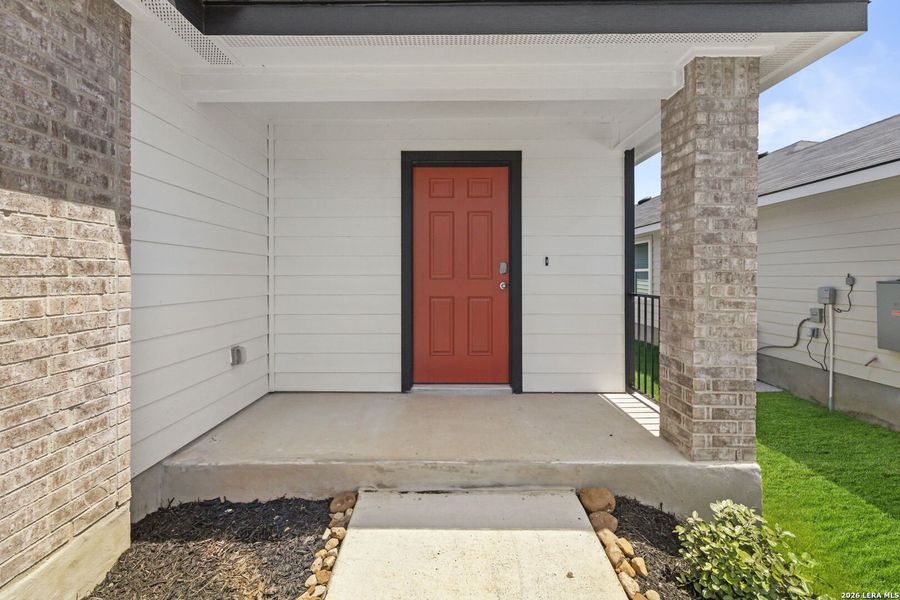 Exterior details and patio area of a home in Hickory Ridge, Elmendorf (Image 2). Exterior details and patio area of a home in Hickory Ridge, Elmendorf (Image 2).