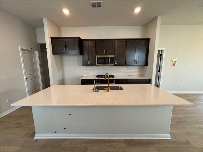 Furnished interior view inside a new home in Cannon Ranch 40s, Dripping Springs (Image 6).