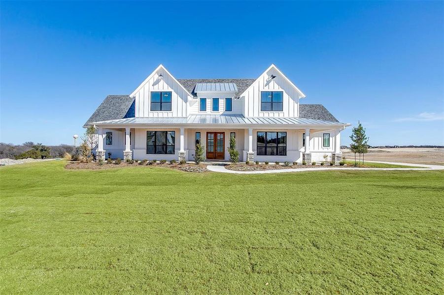 Front exterior of a new home in Aledo Heights, Aledo, TX, highlighting curb appeal (Image 2). Front exterior of a new home in Aledo Heights, Aledo, TX, highlighting curb appeal (Image 2).