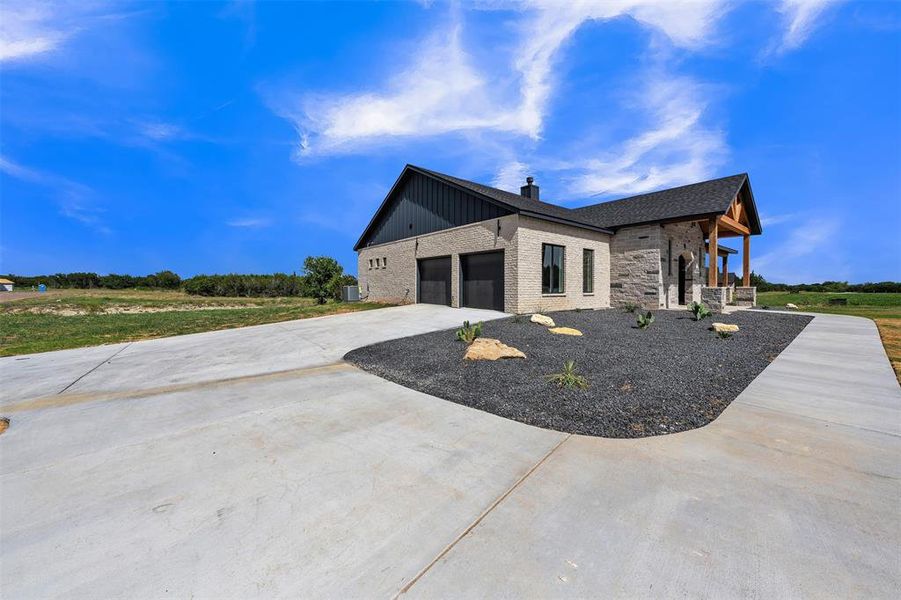 Front exterior of a new home in , Rio Vista, TX, highlighting curb appeal (Image 18).