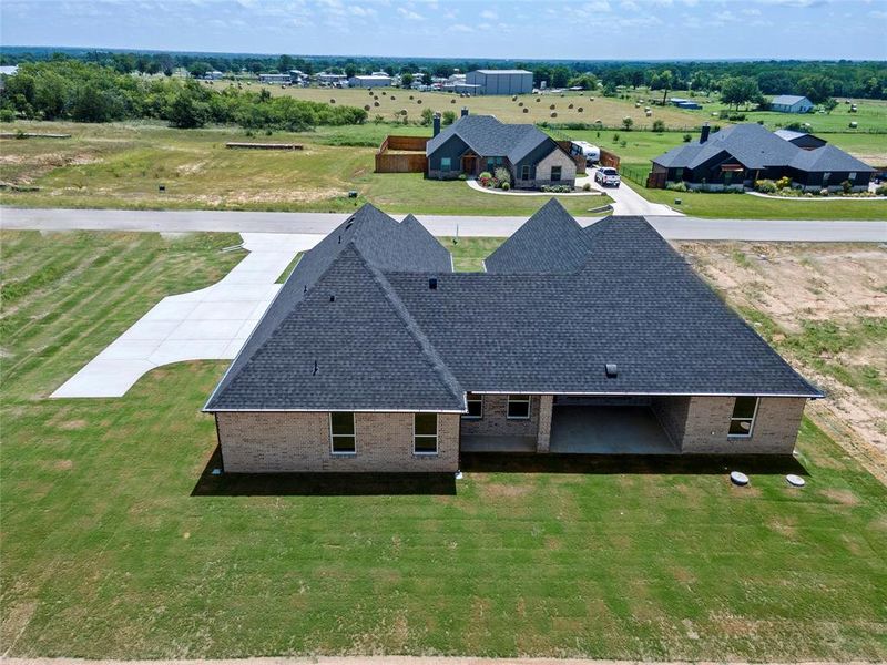 Front exterior of a new home in , Paradise, TX, highlighting curb appeal (Image 23).
