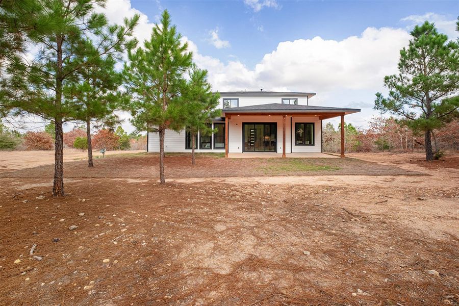 Rear view of property with a patio area