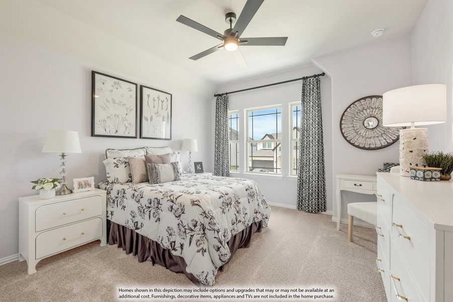 Bedroom with carpet flooring, ceiling fan, white furniture, and a double window with patterned curtains Bedroom with carpet flooring, ceiling fan, white furniture, and a double window with patterned curtains