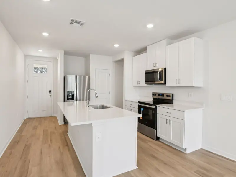Furnished interior view inside a new home in Salt Meadows - Premier Series, Parrish (Image 3).