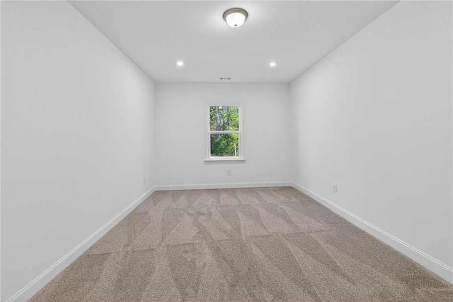 Spacious, unfurnished interior of a new home in Riversprings, Dacula (Image 33).
