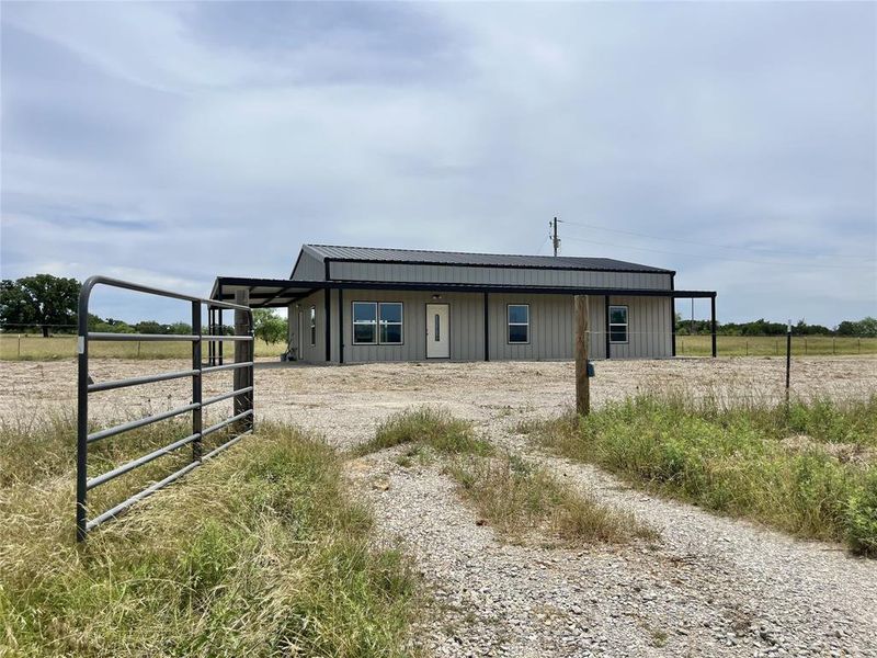Exterior details and patio area of a home in , Mineral Wells (Image 16).
