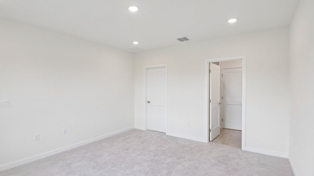 Furnished interior view inside a new home in Grasslands West, Lakeland (Image 18).