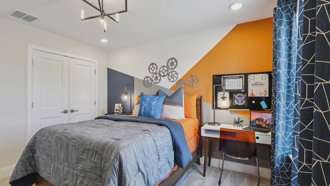 The Mangrove Second Floor Bedroom at Lakeside at Satilla by DRB Homes in Saint Cloud, FL The Mangrove Second Floor Bedroom at Lakeside at Satilla by DRB Homes in Saint Cloud, FL