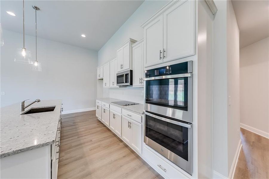 Furnished interior view inside a new home in , Homer (Image 3). Furnished interior view inside a new home in , Homer (Image 3).