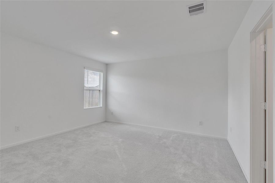 Spacious, unfurnished interior of a new home in Tavola: Cottage Collection, New Caney (Image 20).