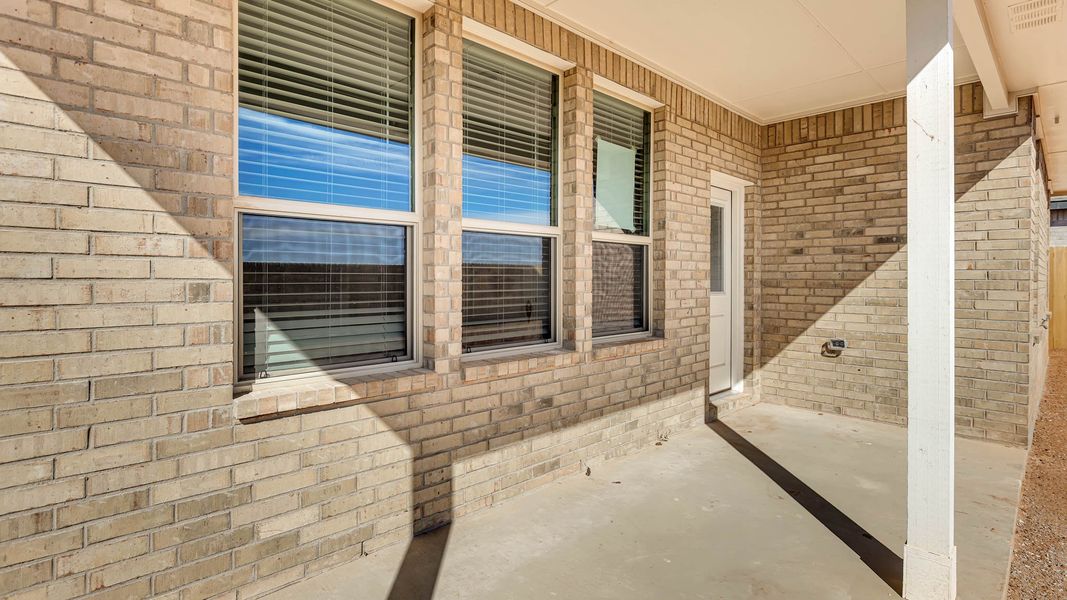 Exterior details and patio area of a home in Northwest Passage, Midland (Image 3). Exterior details and patio area of a home in Northwest Passage, Midland (Image 3).