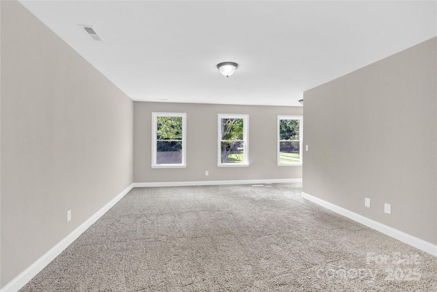 Primary Bedroom w/ bump out to the right for office/exercise/flex space.